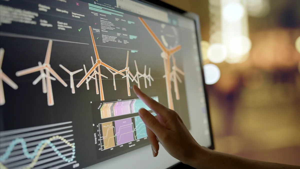 Computer screen shows data, images & moving graphics associated with climate change.